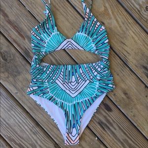 One piece swimsuit with sexy cutout!